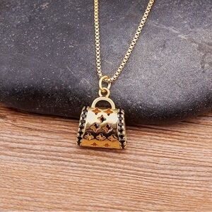 Gold-tone Mini Purse Pendant Necklace